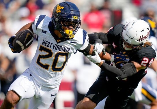 Image for story: WVU pulls off 45-35 road upset against No. 22 Houston