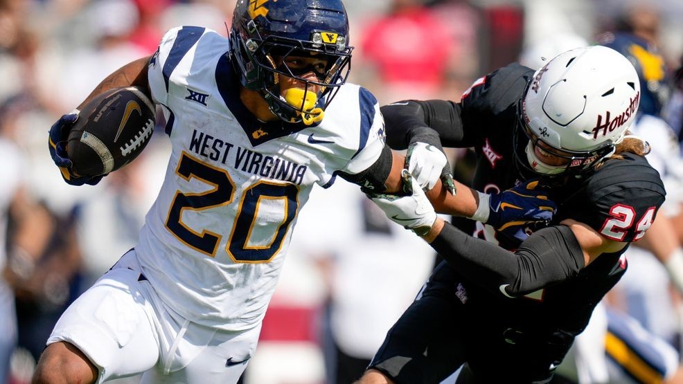 Image for story: WVU pulls off 45-35 road upset against No. 22 Houston