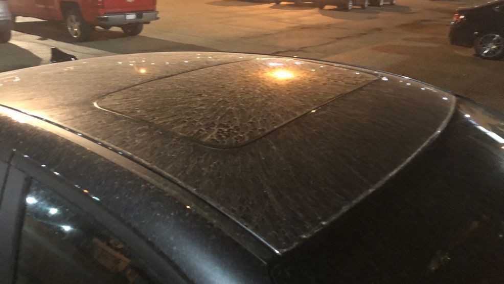 Image for story: 'Muddy rain' from dust storm in Texas covers cars locally