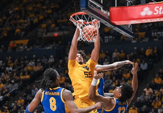 Image for story: WVU stifles Pitt's offense to win 71-49 in men's basketball edition of Backyard Brawl